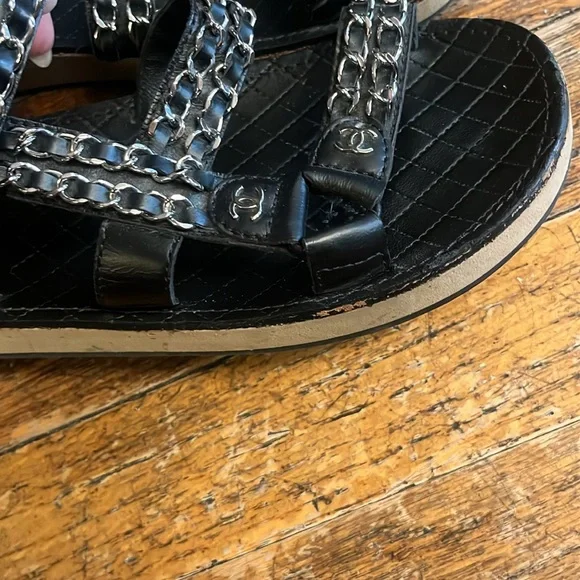 Chanel black leather and silver chain velcro logo sandals. Sandals